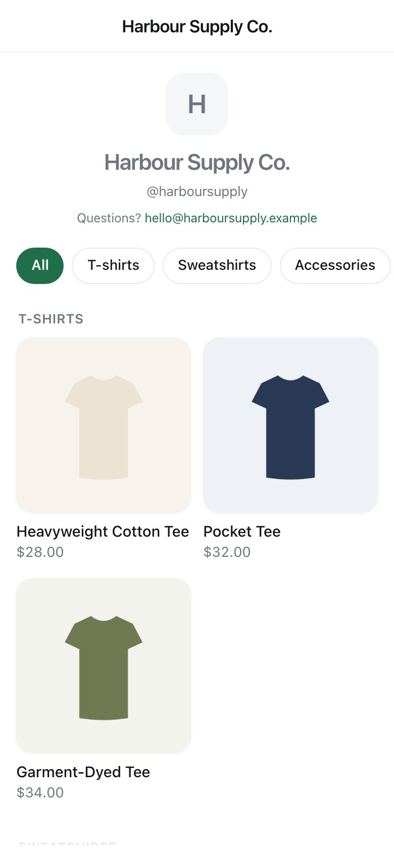 A shop page with T-shirts, a hoodie and a cap, each with a photograph and a price