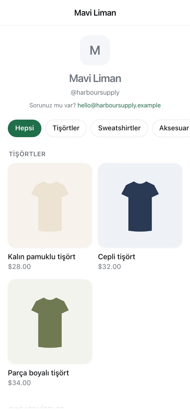 A shop page with T-shirts, a hoodie and a cap, each with a photograph and a price